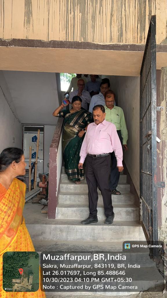 Staff on campus staircase