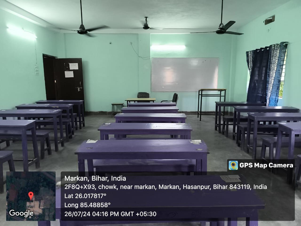 Spacious classroom with rows of desks