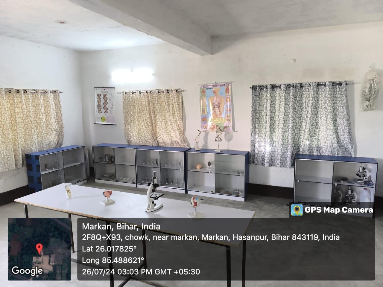 Biology laboratory with microscopes and anatomical models